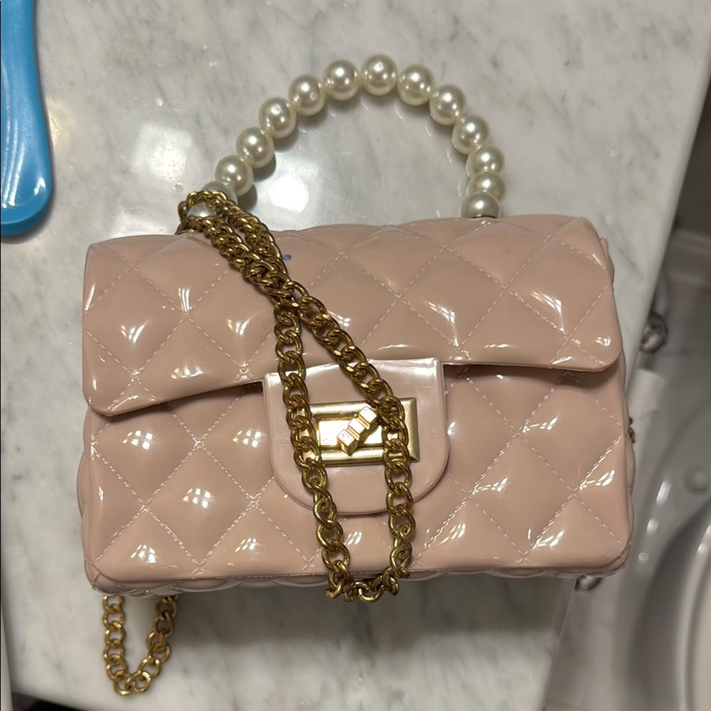 Elegant Pink Quilted Handbag with Pearl Handle